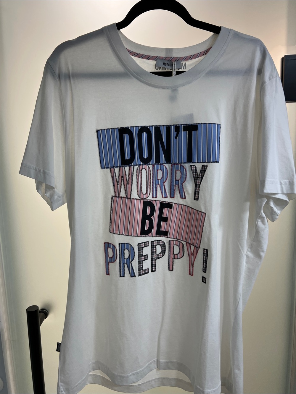 Moschino White Graphic Tee with Blue and Pink Lettering